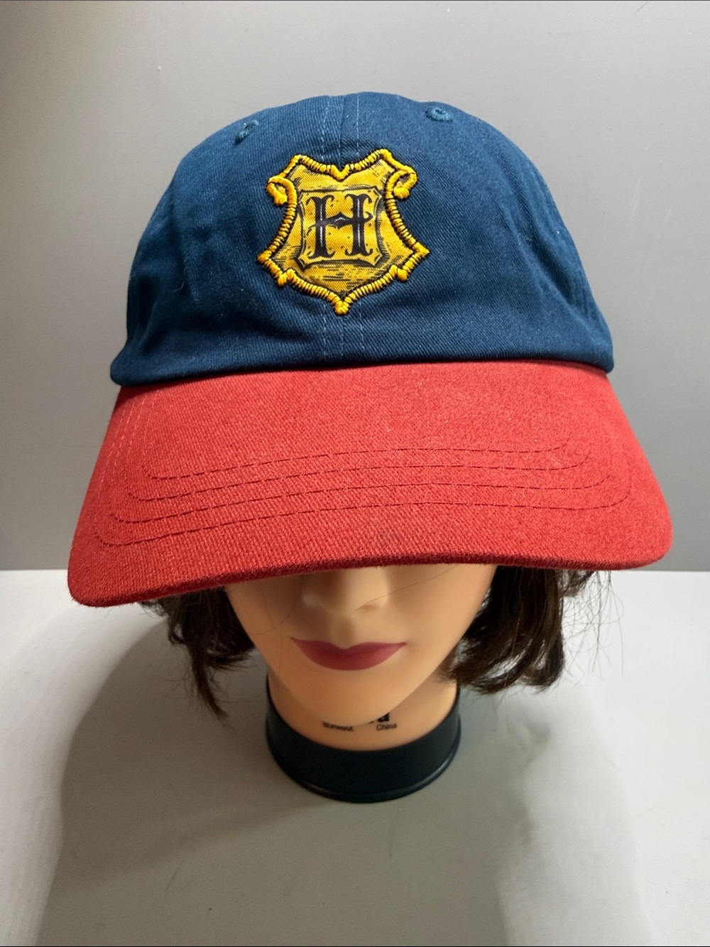 Two-Tone Navy and Red Baseball Cap with Yellow Shield Patch
